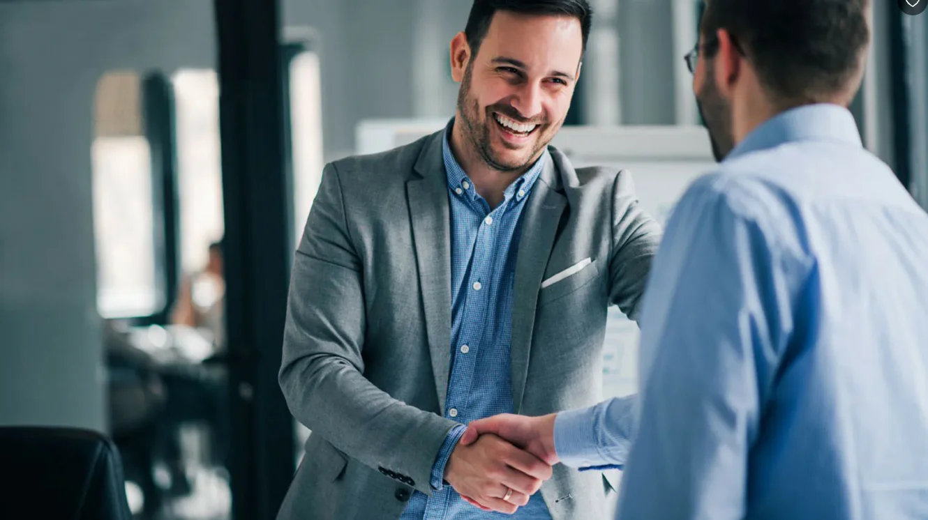 Professional partnership handshake